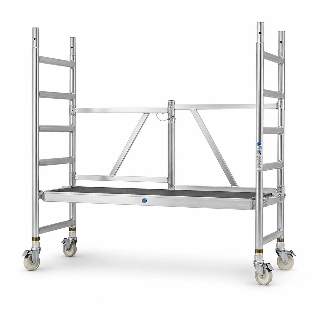 Aluminium folding access tower on wheels on a white background