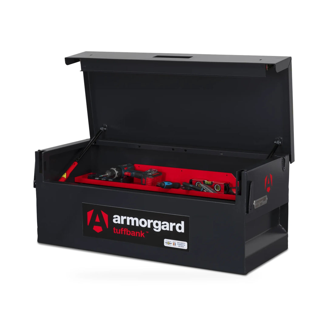 Armorgard TuffBank TB12 Truck Box — with optional shelf and illustrative tools. Optional shelf shown; tools are illustrative and not included.